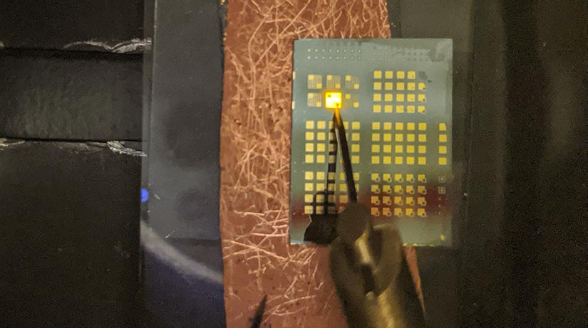 Photo of light-emitting diode (LED) device on substrate.