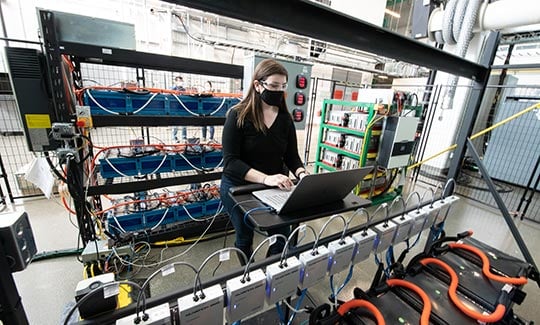 interns-edu-62809 NREL researcher Emma Raszmann works in the Energy Storage Lab.