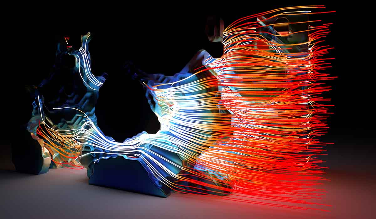 Researcher presenting in front of a wall-sized 3D data visualization