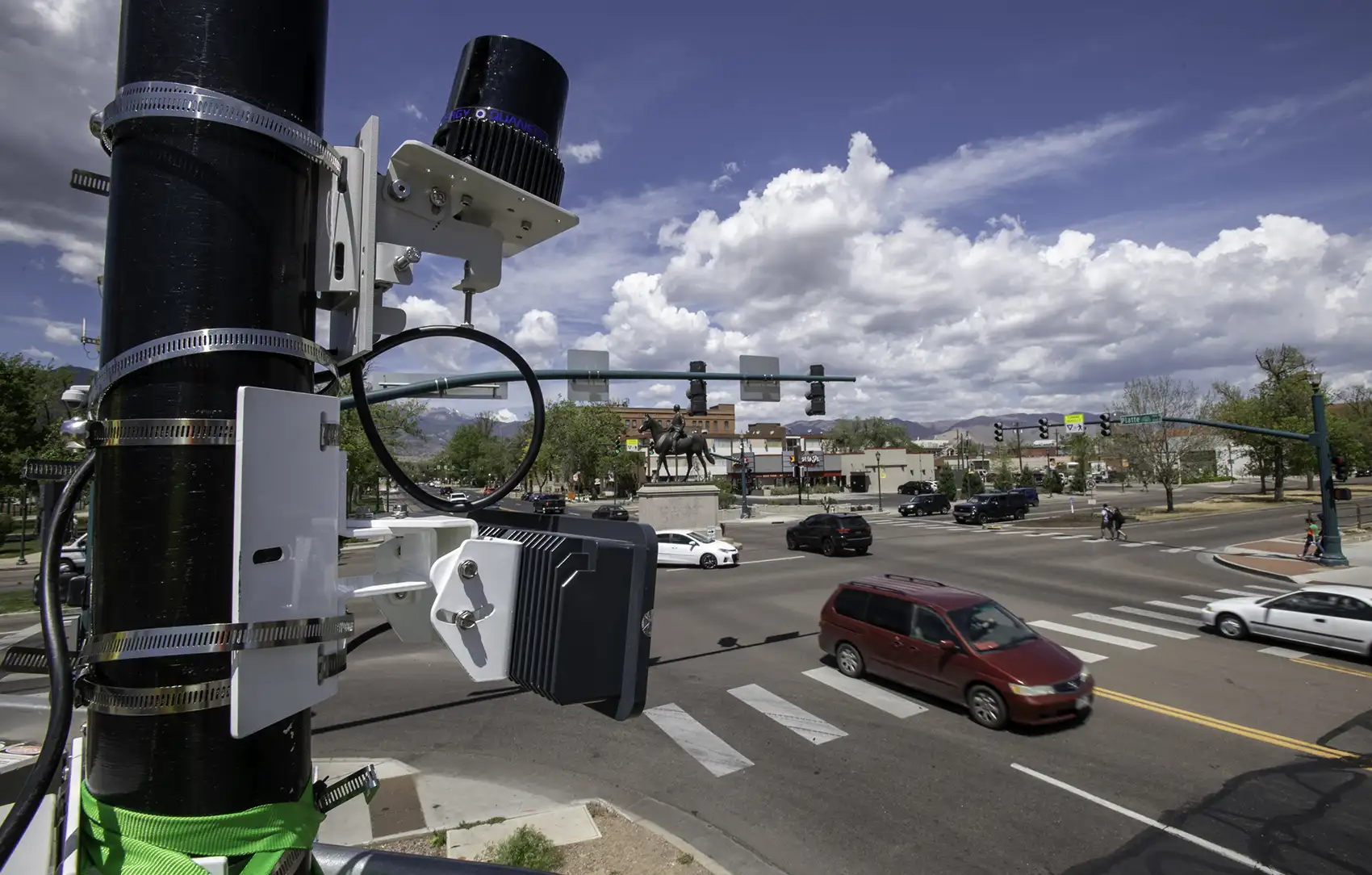 20261021-super-intelligence-speeds-up-transportation-research-at-national-laboratory-of-the-rockies-068143 LIDAR sensors mounted atop a Colorado Springs Traffic Department vehicle are used to detect and gather data on traffic moving through the intersection.
