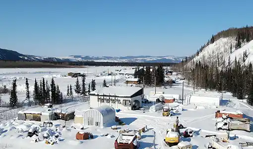 An aerial image of Hughes, Alaska, in the snow.
