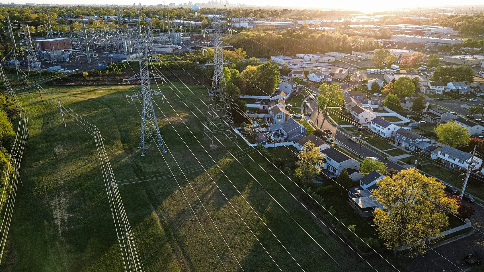 Power lines next to a residential neighborhood.