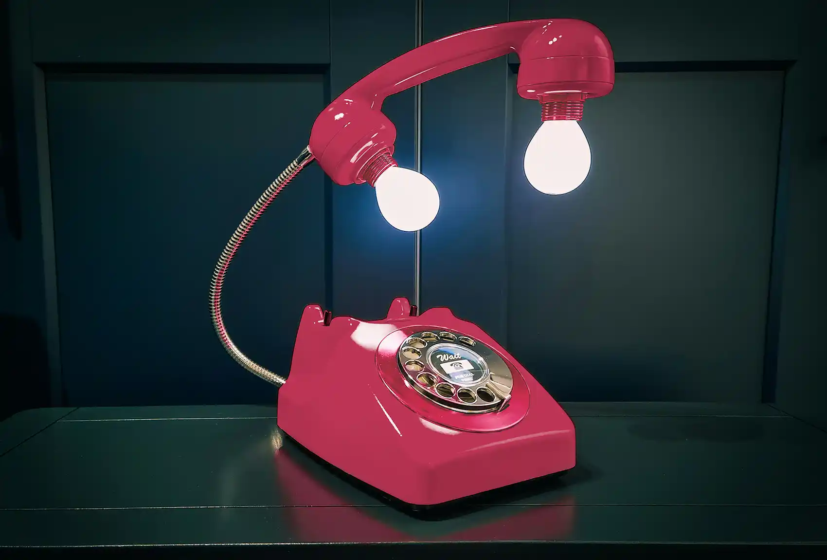 20260729-students-to-help-identify-retirement-options-for-energy-technologies-unsplash A red rotary phone with light bulbs in the receiver.