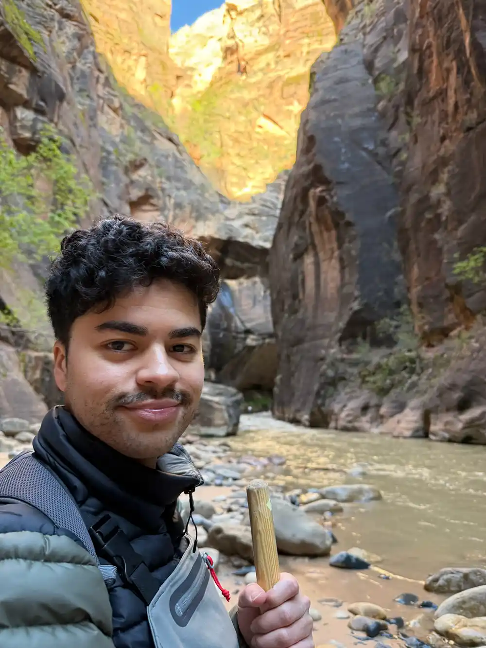 Portrait of Patrick Emami hiking.