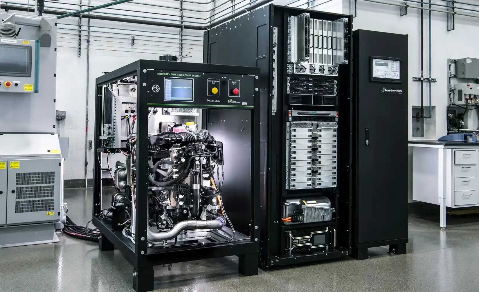 hydrogen-fuel-cell-power-system-48941 A piece of mechanical equipment inside a laboratory, composed of tubes, wires, and other materials.