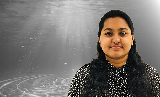 beneaththesurface-ritu-treisa-philip-510x310 Ritu Treisa Philip overlain on a black-and-white image of underwater.